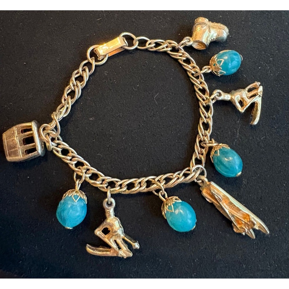 Vintage Gold-Tone Winter Sports Skiing Charm Bracelet Blue Glass Dangles